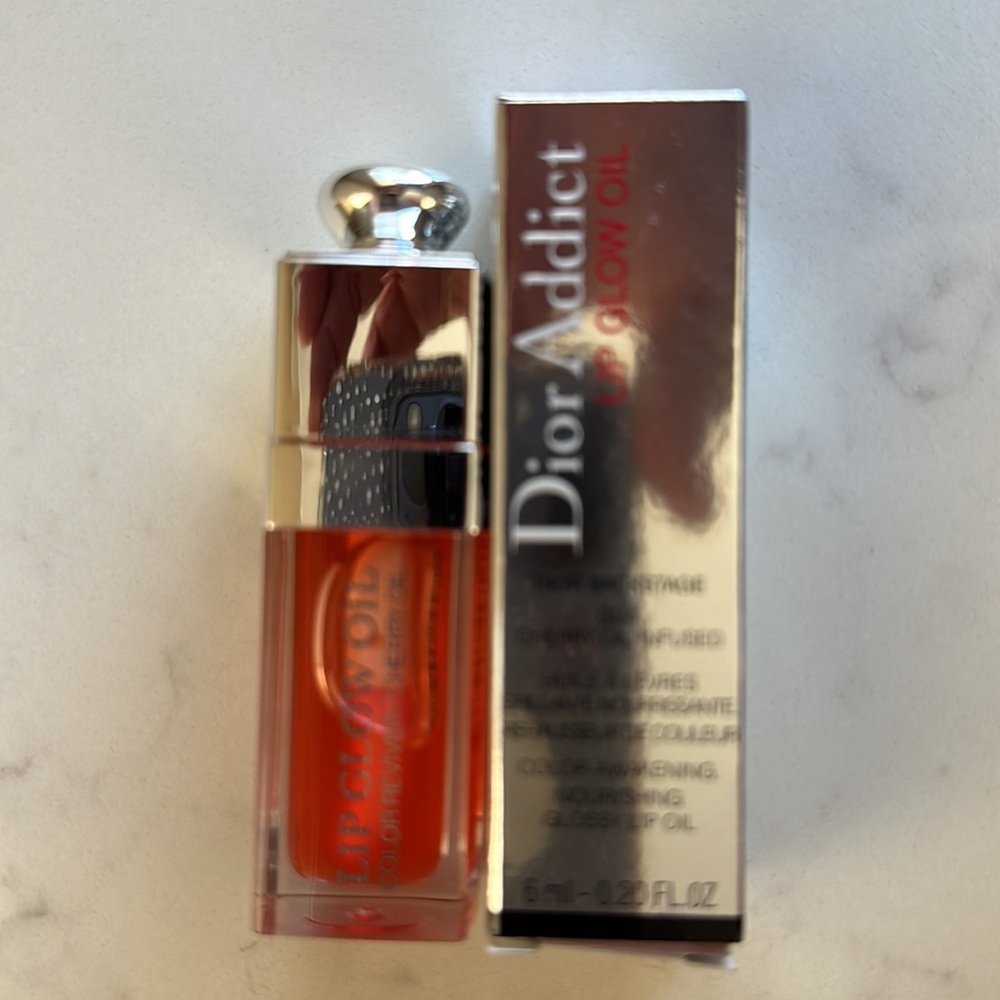 Dior Lip Addict Lip Glow Oil, color is Coral